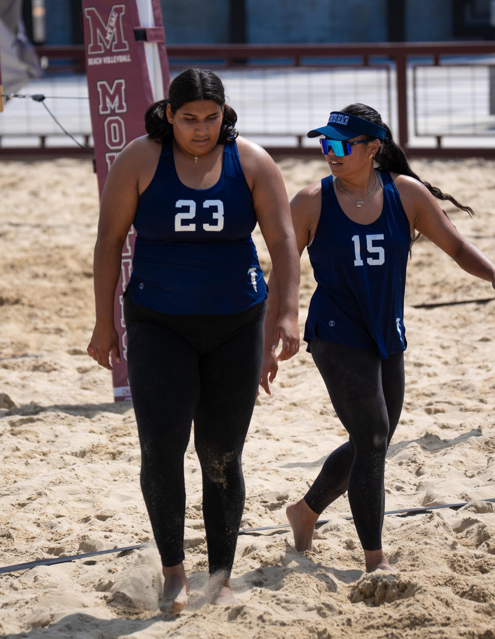 Monserrat Rodriguez (23) and Madison Borja (15) discuss strategy against Mt. San Antonio