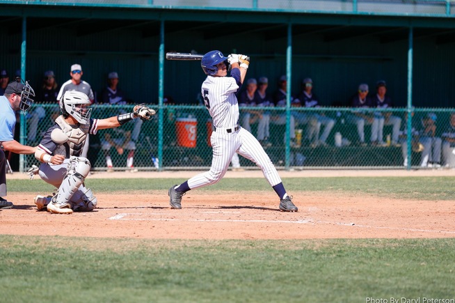Mike Santos drove in two runs and hit a home run on the day