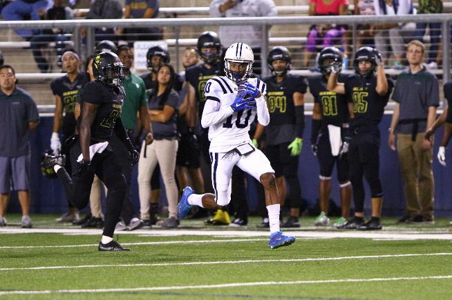 Stacy Chukwumezie races down the sideline for a 93-yard TD reception