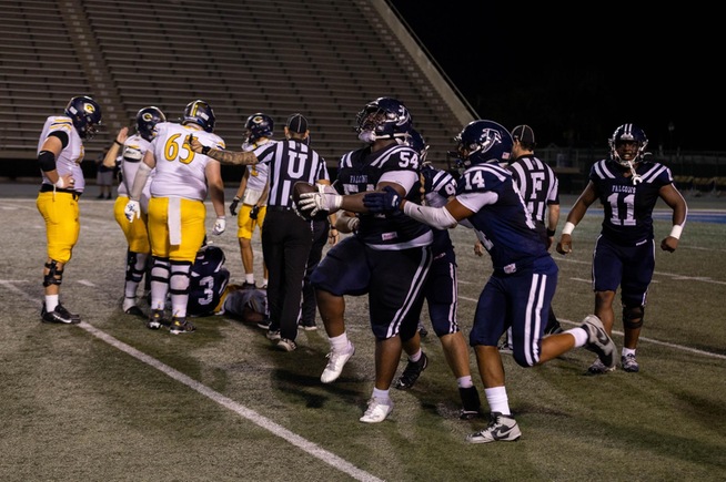 Danny D. Washington (54) comes up with a key fumble recovery in the Falcons win