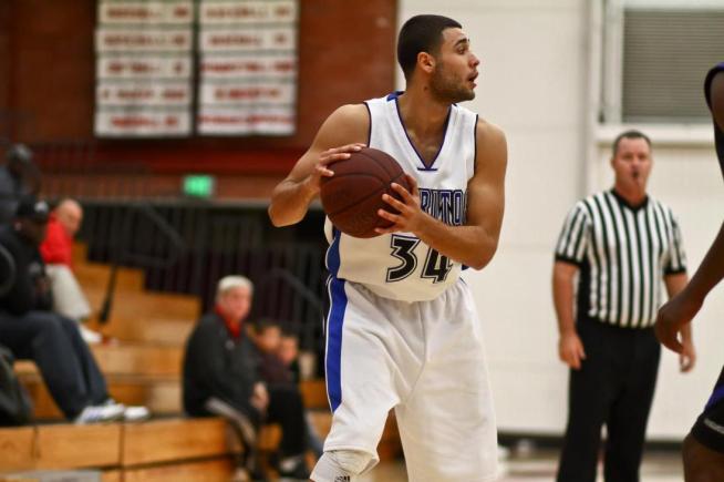 File Photo: Andrew Torres (34) led the Falcons with 13 points in their 92-81 loss to Santa Ana.