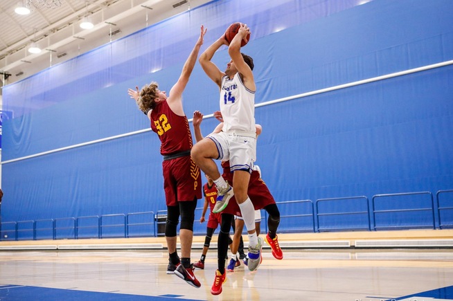 Garrett Bell goes up for two of his game-high 18 points