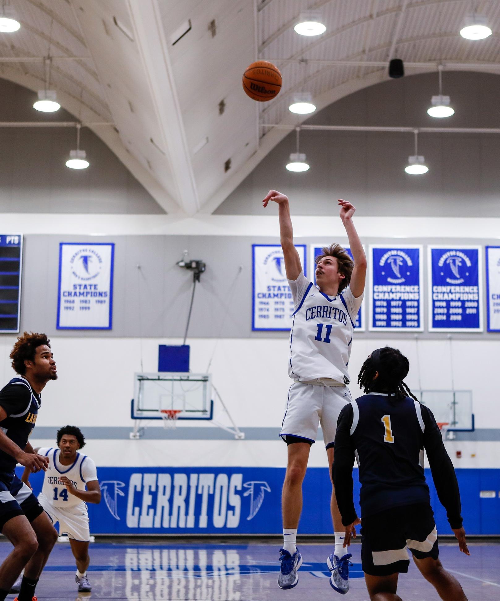 File Photo: Everett May (11) knocks down five 3-pointers in the Falcons win