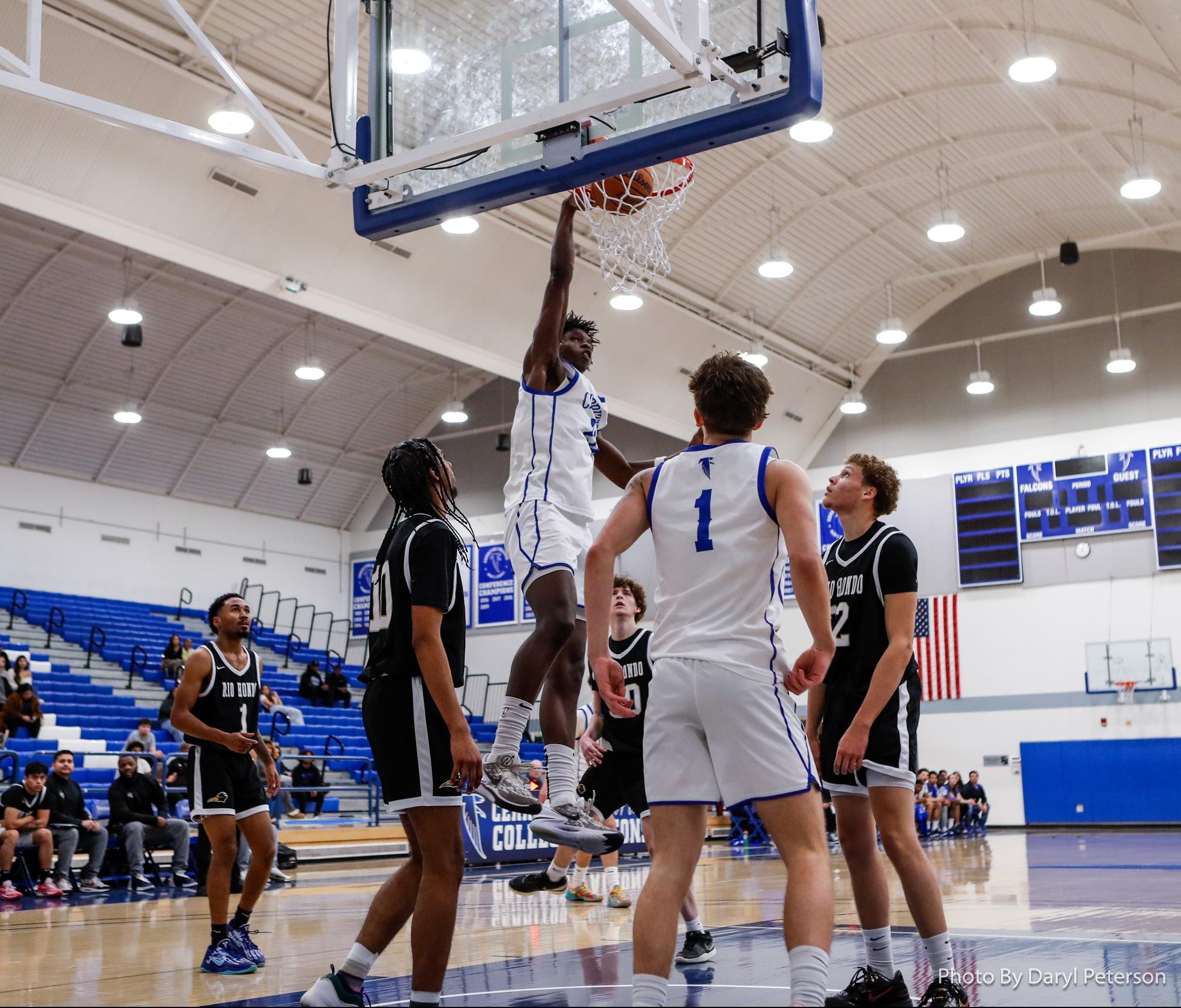 Spencer Ezewiro slams home a bucket for the Falcons