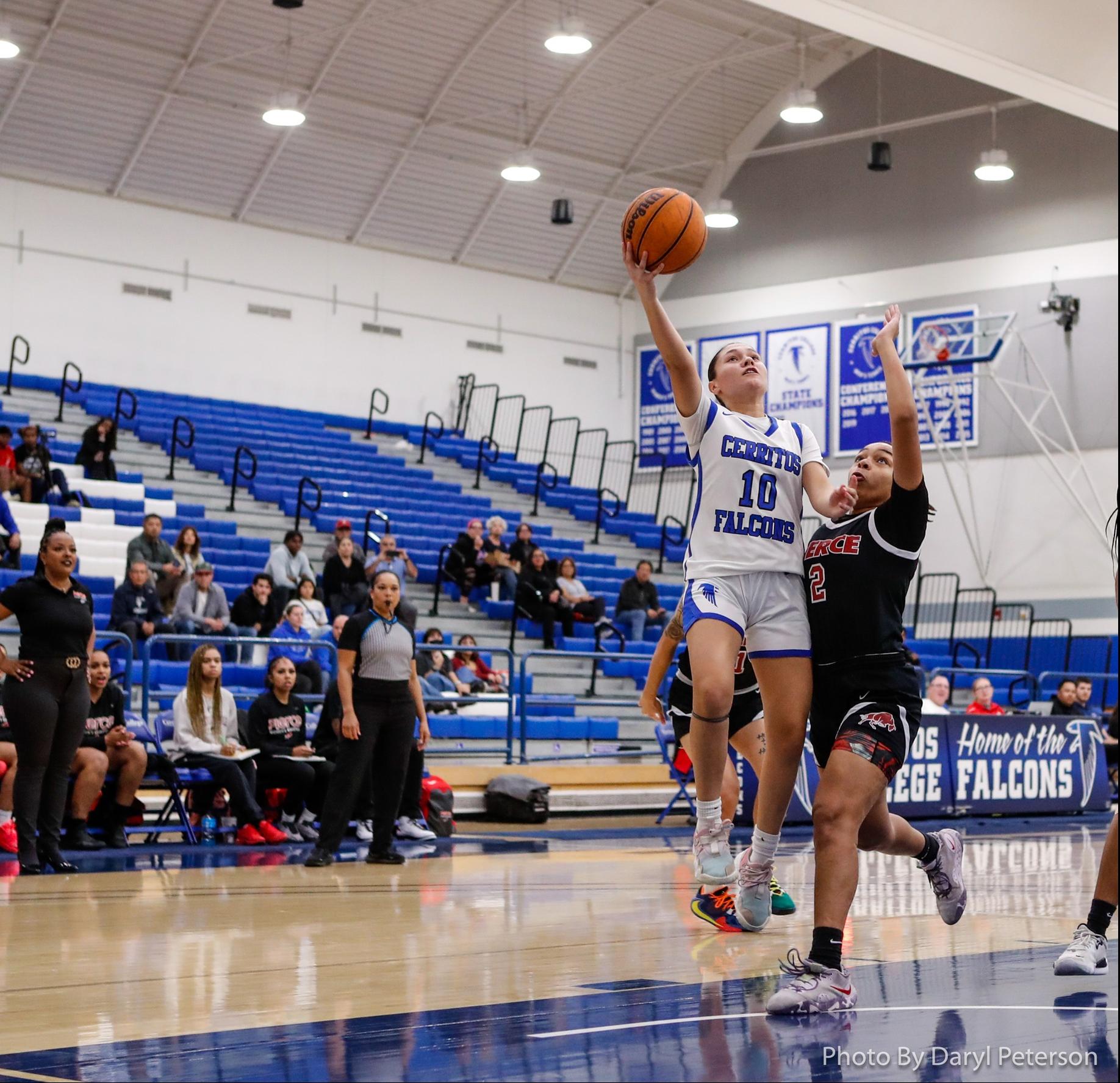Rayne Rodriguez drives in for two of her career-high 26 points