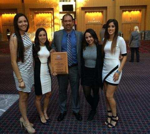 Head coach Ruben Gonzalez (middle) is flanked by All-Americans Adriana Salazar, Nayeli Requejo, Ashley Anaya-Webb and Makayla Mendoza
